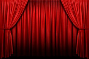 Red stage curtain with arch entrance